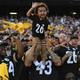 Pittsburgh Steelers fans watch the action during a game against the San Diego Chargers at Qualcomm Stadium on Oct. 12, 2015, in San Diego.
Donald Miralle/Getty Images